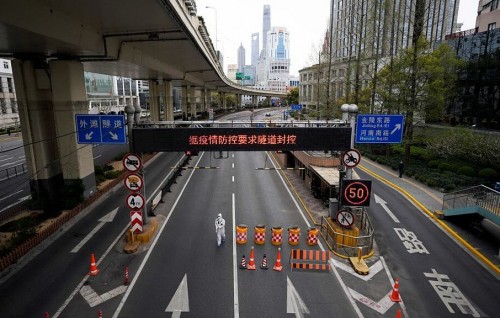China's Shanghai split in two for COVID-19 lockdown as asymptomatic cases surge