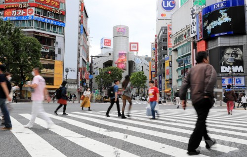 Japan lifts COVID-19 emergency but urges caution