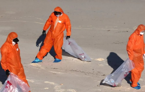 Sydney reopens beaches after tar ball mystery